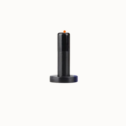 Bouchon de fin de ligne noir avec un petit point orange sur le dessus, conçu pour une sortie inutilisée