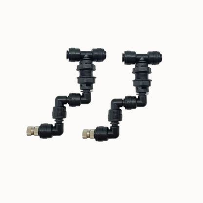 Buse de brumisation en plastique noir avec plusieurs raccords et articulations visibles