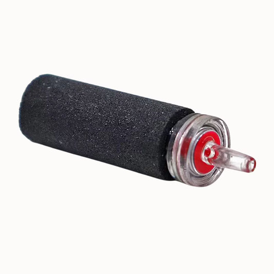 Diffuseur cylindrique noir en sable avec embout transparent et rouge, surface lisse et forme allongée