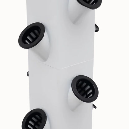 Système de culture vertical blanc avec plusieurs trous noirs pour accueillir des plantes