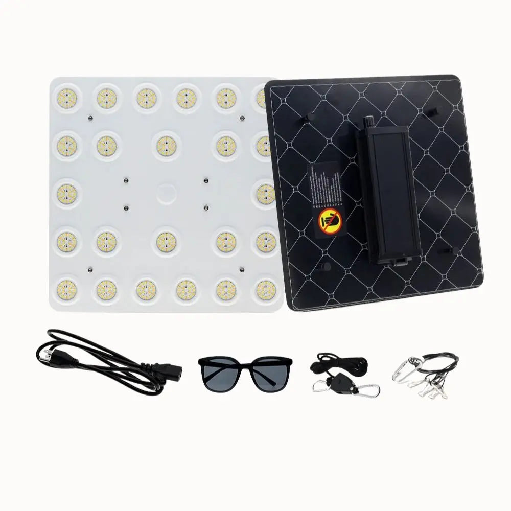 Panneau lumineux avec plusieurs LED blanches, câbles noirs et lunettes de protection sur fond clair