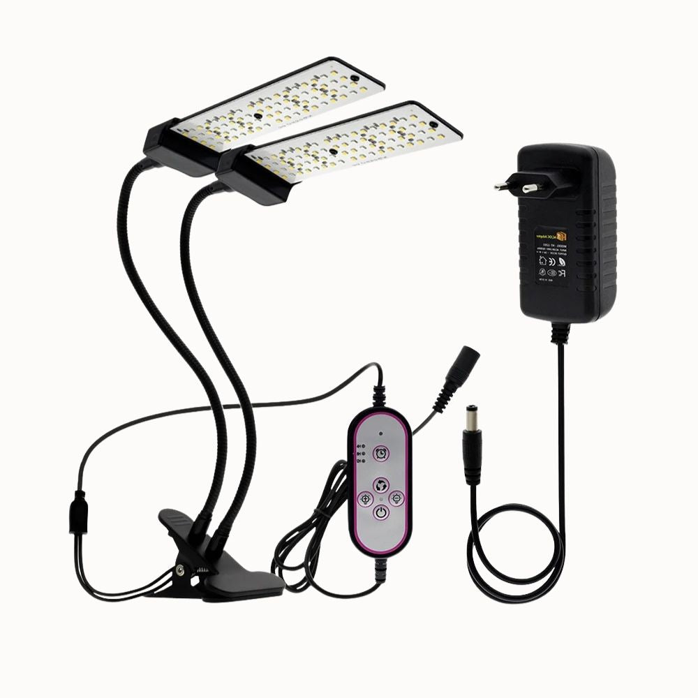 Lampe horticole LED blanche avec deux bras flexibles et un contrôleur à distance sur un fond neutre