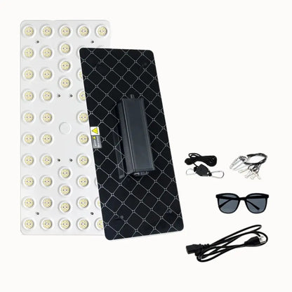 Panneau LED rectangulaire avec de nombreux petits éclairages, câbles et lunettes de protection noires