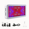 Lampe LED rectangulaire avec des lumières rouges et bleues sur un fond blanc, câbles et crochets visibles