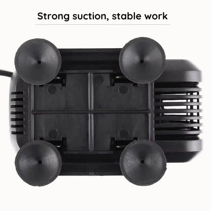 Pompe submersible noire avec quatre ventouses et grille de protection sur le dessus
