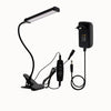 Lampe LED noire avec clip, bras flexible, câble d'alimentation et interrupteur sur le support