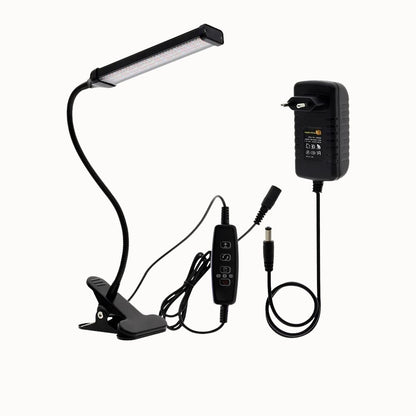 Lampe LED noire avec clip, bras flexible, câble d'alimentation et interrupteur sur le support