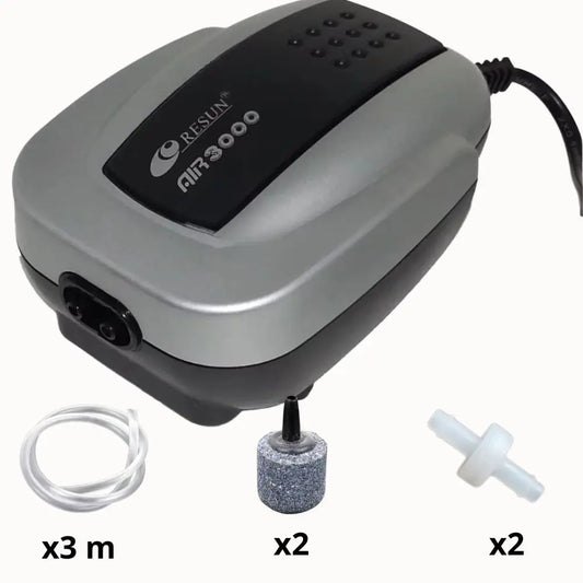 Pompe hydroponie grise avec deux sorties, tuyau transparent, et accessoires en mousse et plastique