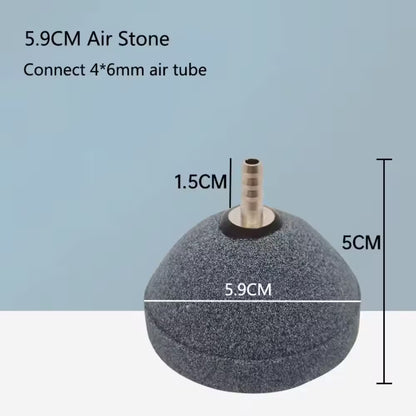 Disque diffuseur d'air circulaire en matériau gris, avec une base noire et une sortie pour tube