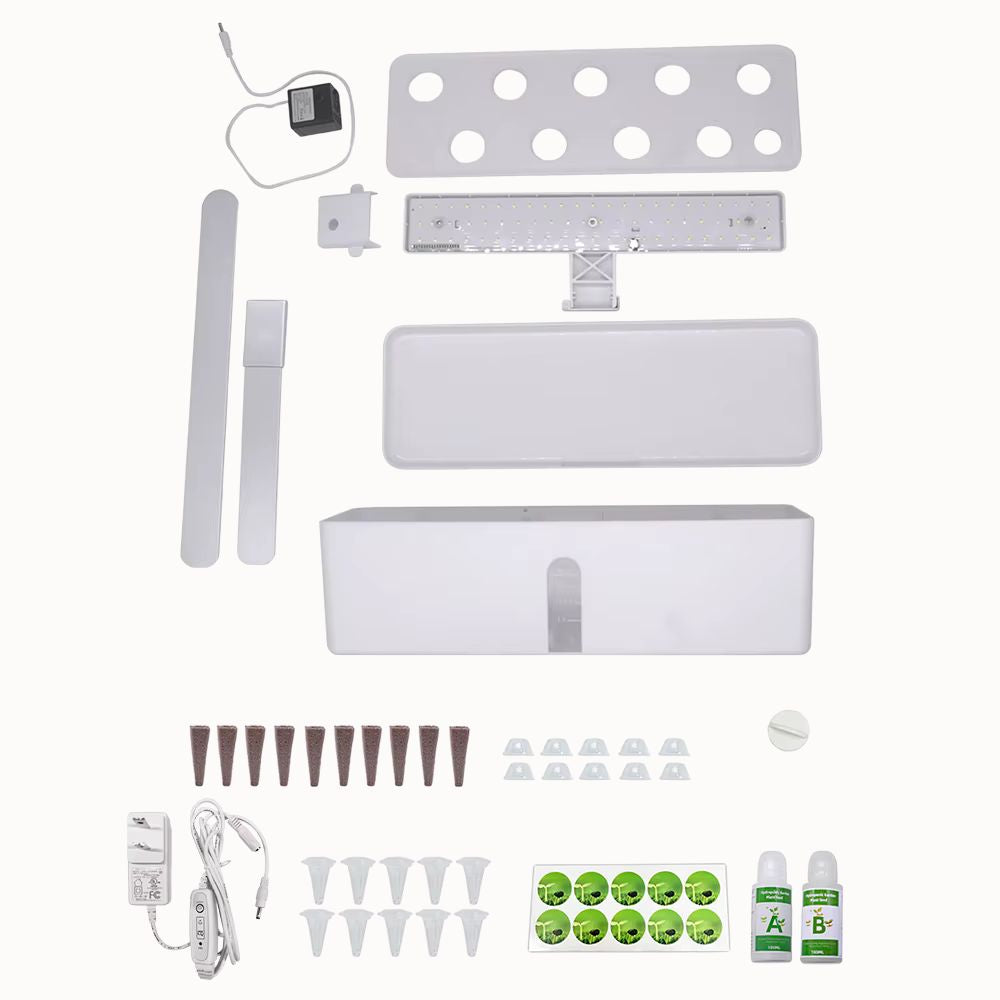 Système de culture intérieure avec éléments en plastique blanc, lampes, réservoir et accessoires de plantation