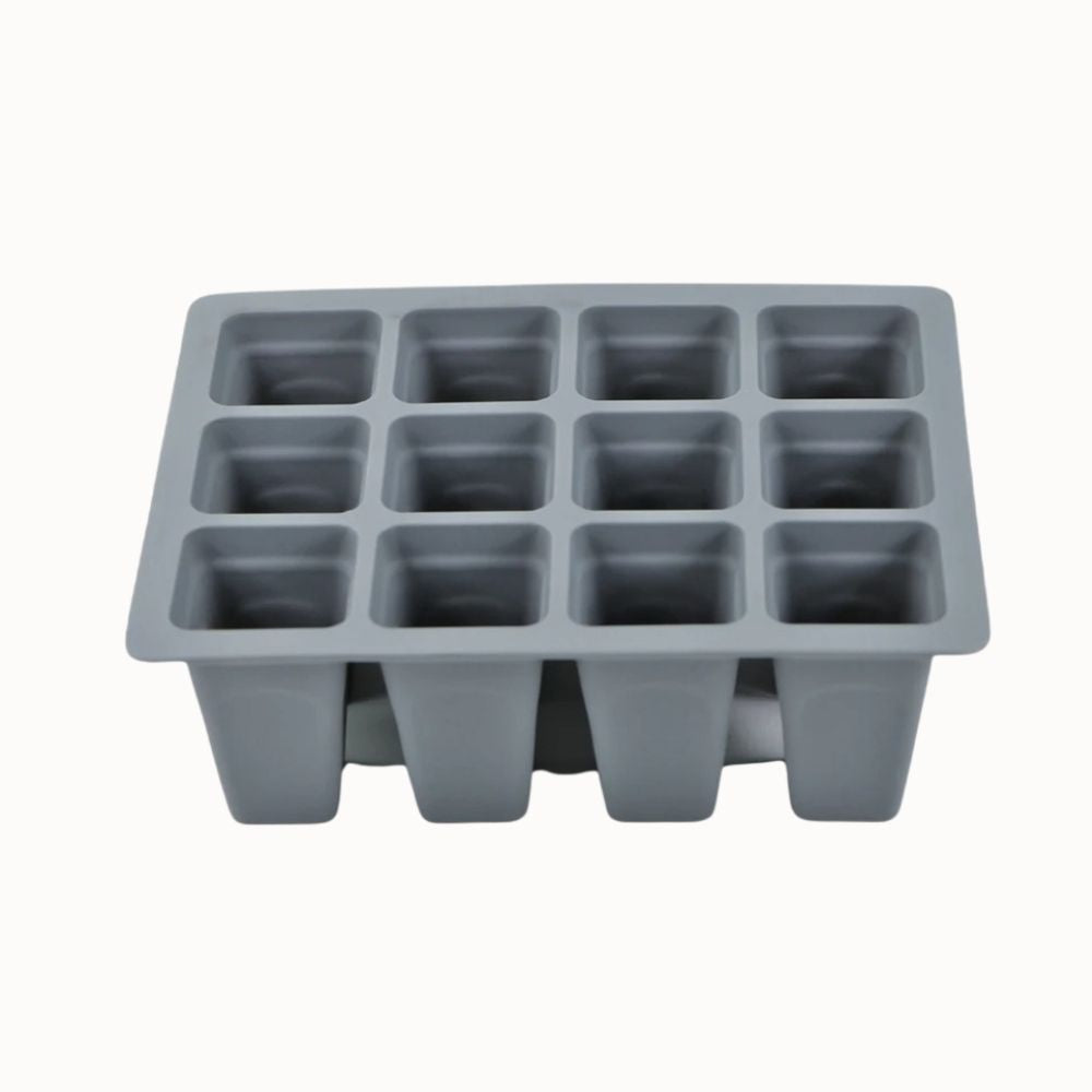 Bac en silicone gris avec douze cellules pour semis et système de drainage intégré