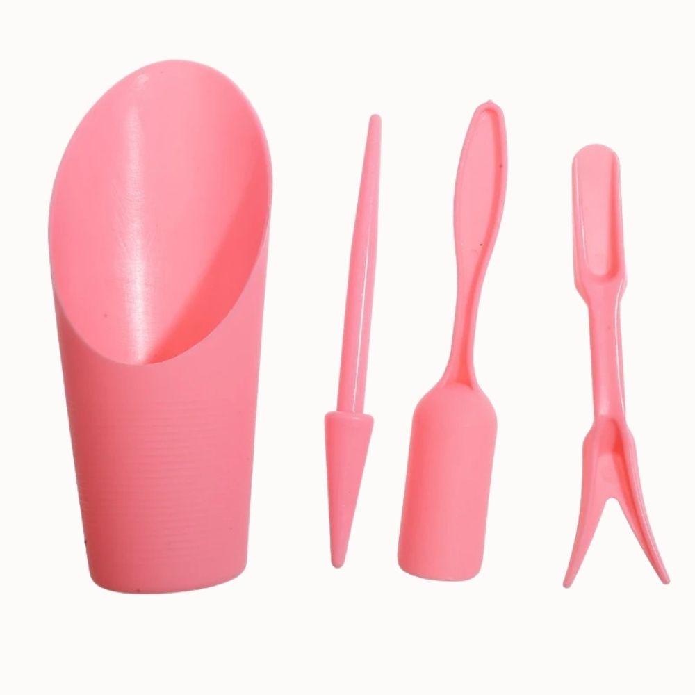 Ensemble d'outils de repiquage en plastique rose, comprenant une pelle, un plantoir et un râteau