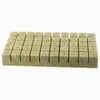 Cubes de laine de roche de couleur beige, disposés en grille avec des trous visibles sur le dessus