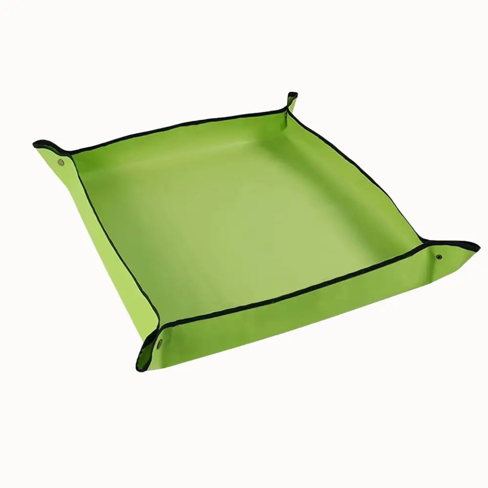 Tapis de rempotage en PVC vert avec bords noirs, forme carrée et surface lisse et étanche