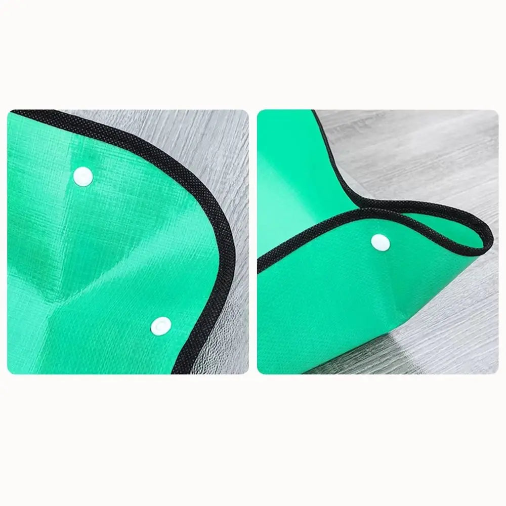 Tapis de rempotage vert avec bords noirs et œillets, posé sur une surface claire et lisse