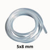 Tube en silicone alimentaire transparent, souple, enroulé sur lui-même, avec une surface lisse et brillante